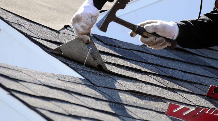 Expert tile roof repair services in Chouteau, OK